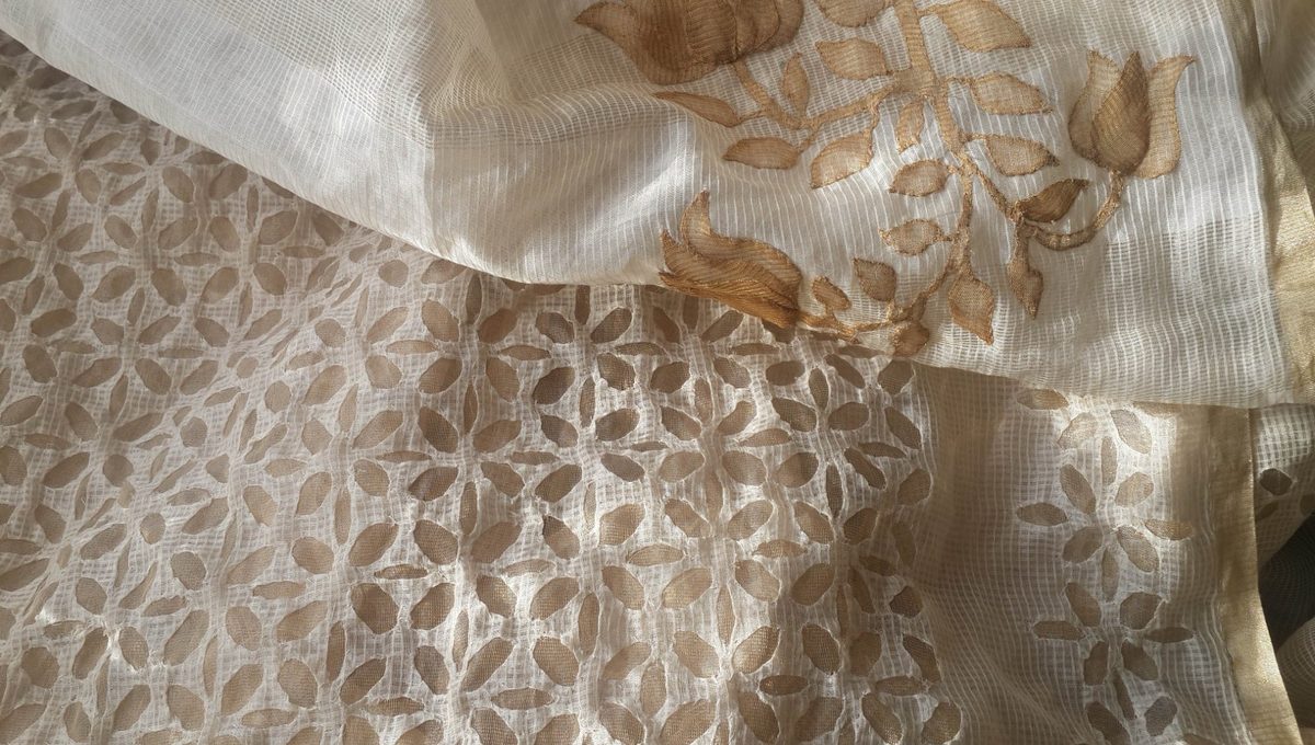 Close-up of reverse appliqué on tissue silk